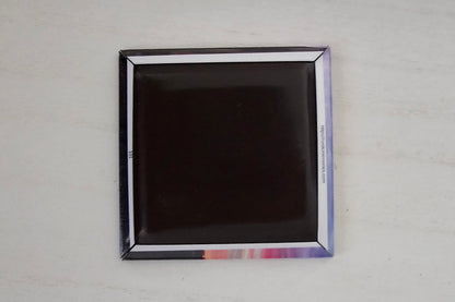 Close-up of custom photo magnets showing print quality