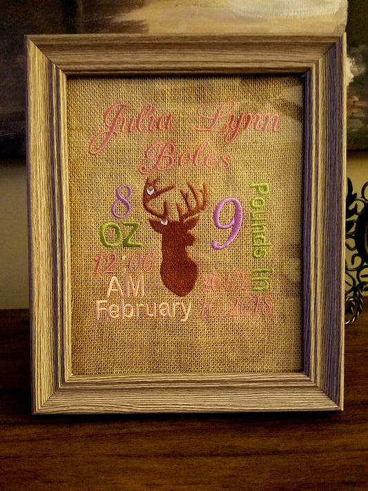 Framed embroidered burlap birth announcement with baby's birth details