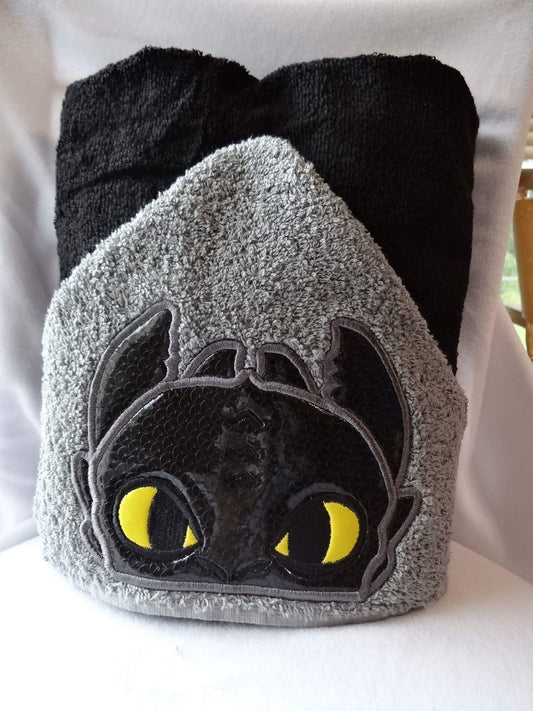 Hooded towel black dragon design appliqué