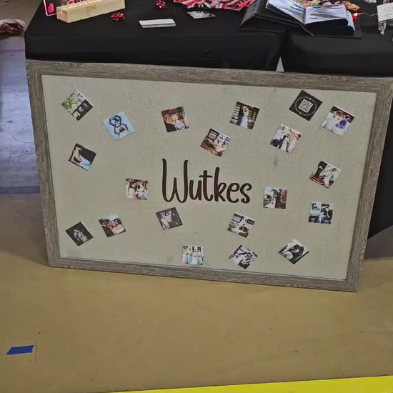 Video of 24x36 magnetic display frame with custom vinyl name and personalized photo magnets