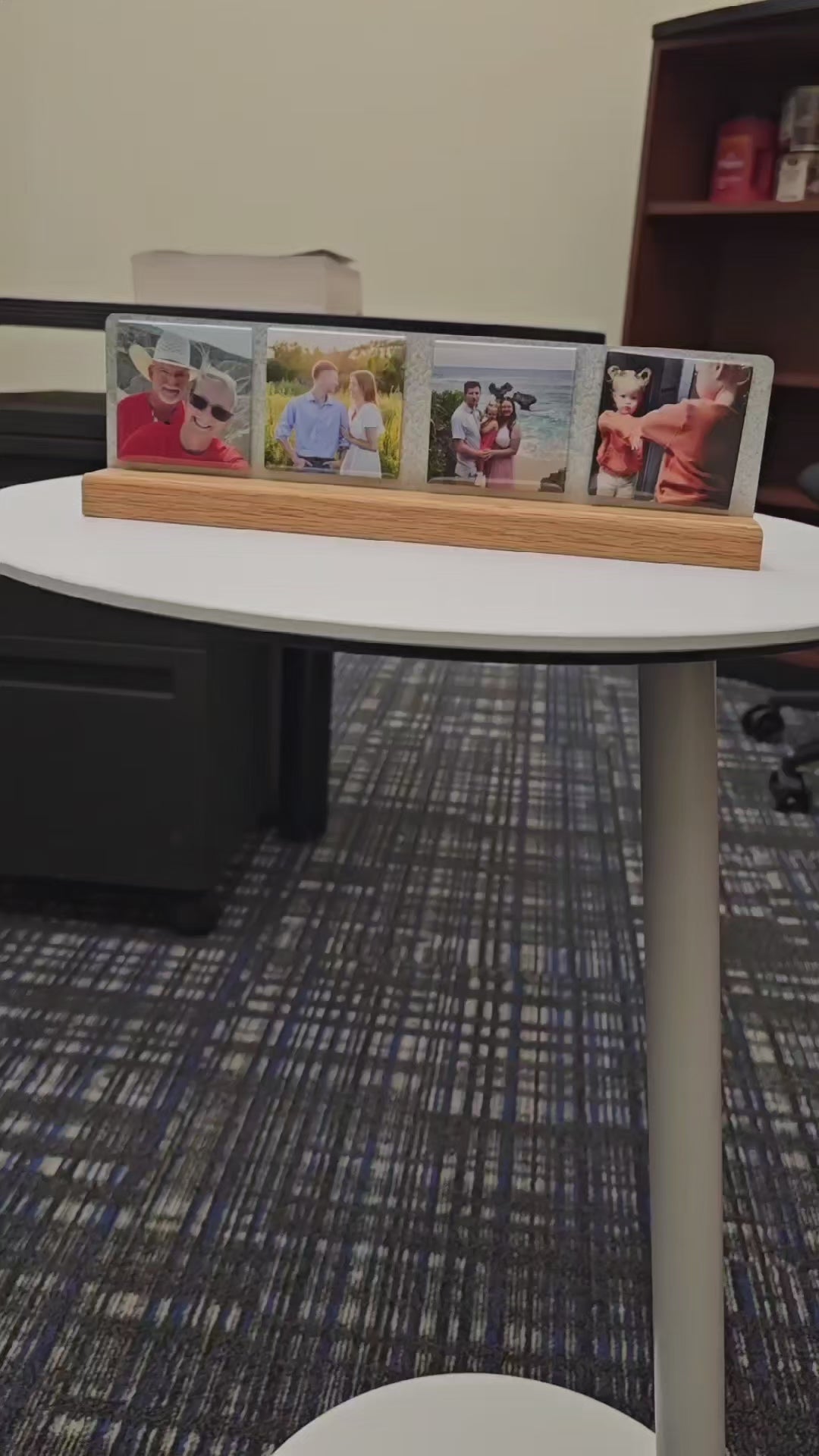 Video of solid oak photo magnet desk stand holding 4 custom photo magnets